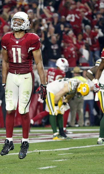 Cardinals' "Hail Larry" trumps Rodgers' Hail Mary